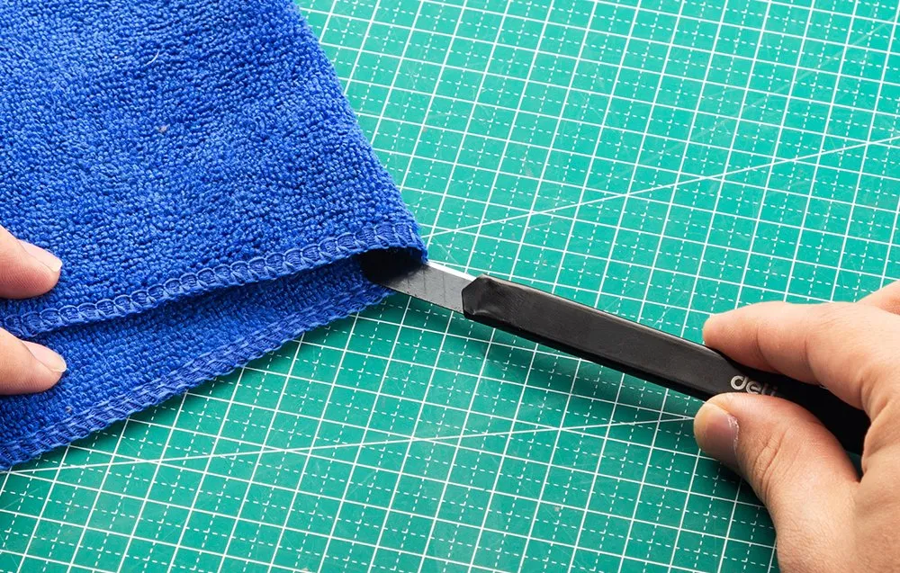 Cutter de acero inoxidable para cuchillas de 9 mm con Autostop