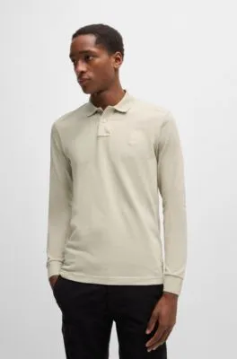 Polo slim fit de algodón elástico con parche de logo