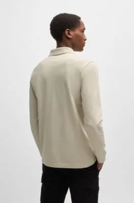 Polo slim fit de algodón elástico con parche de logo