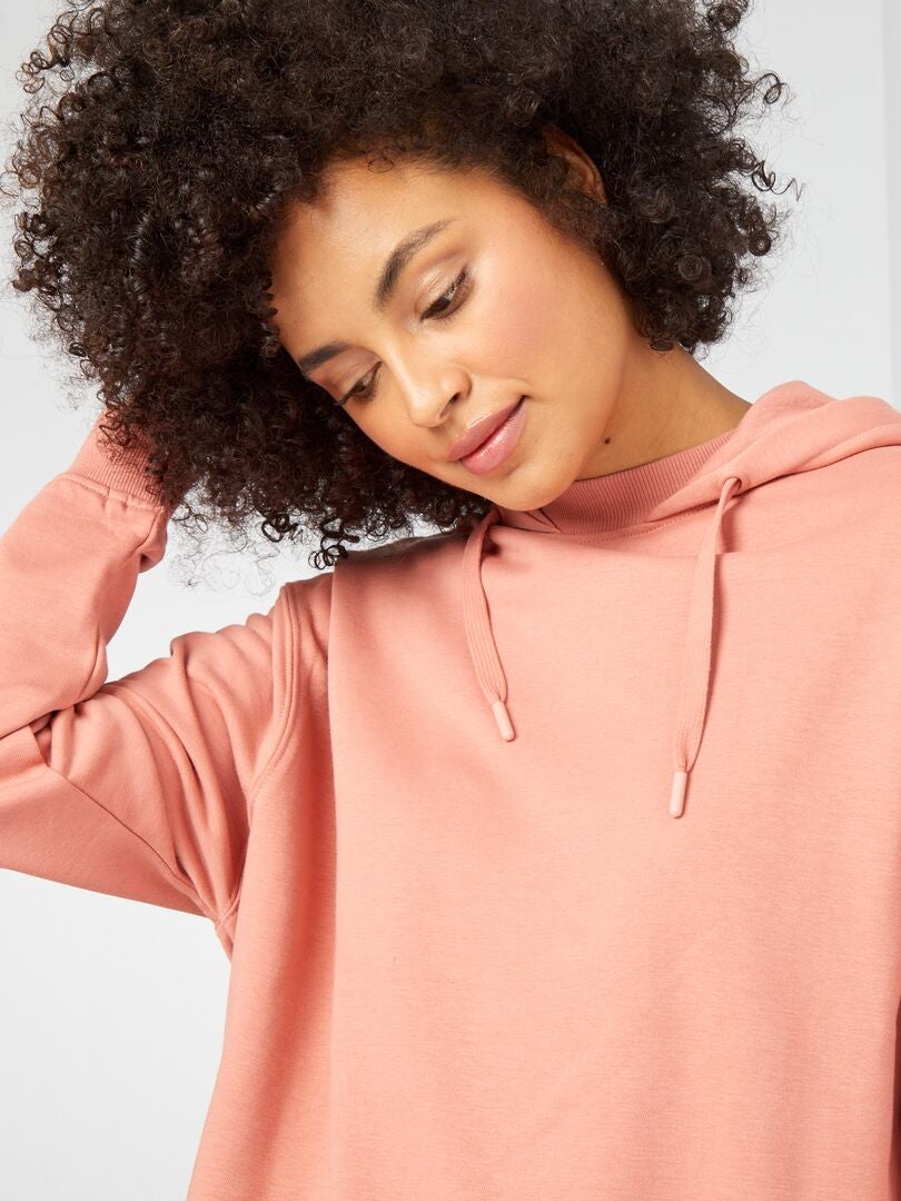 SUDADERA CON CAPUCHA CORTE LARGO  ROSA