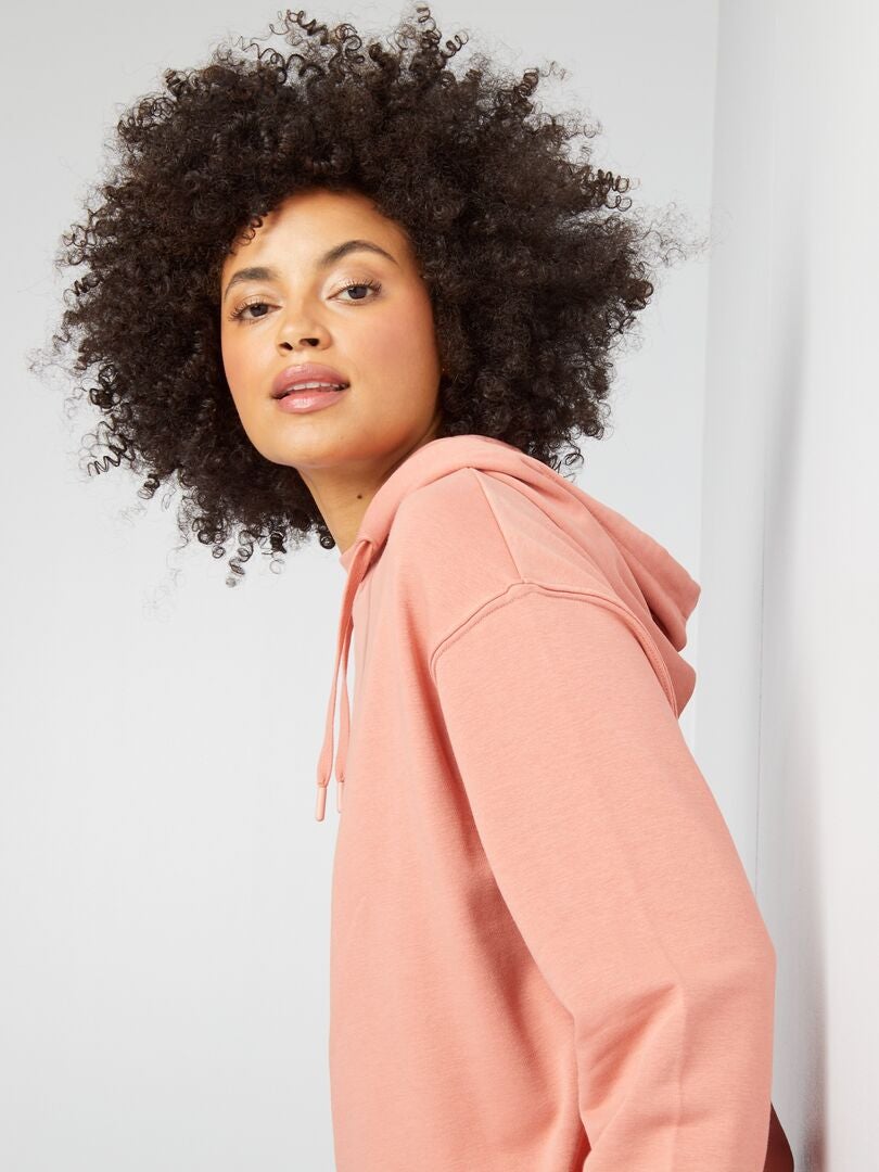 SUDADERA CON CAPUCHA CORTE LARGO  ROSA